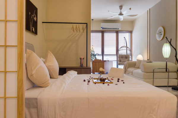 Minimalist bedroom interior at FIVE SENSES – KIP CORE with warm tones, soft furnishings, and balanced lighting.