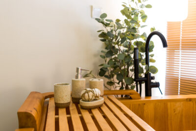 Interior detail shot at FIVE SENSES – KIP CORE highlighting layered lighting and natural materials.