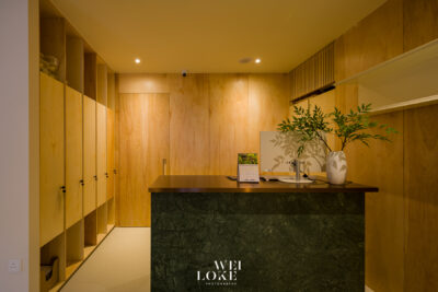 Premium healthcare photography of Tria Dental reception area with modern branding.