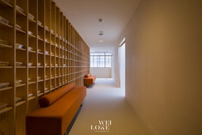 Premium healthcare photography of Tria Dental clinic corridor with clean design.